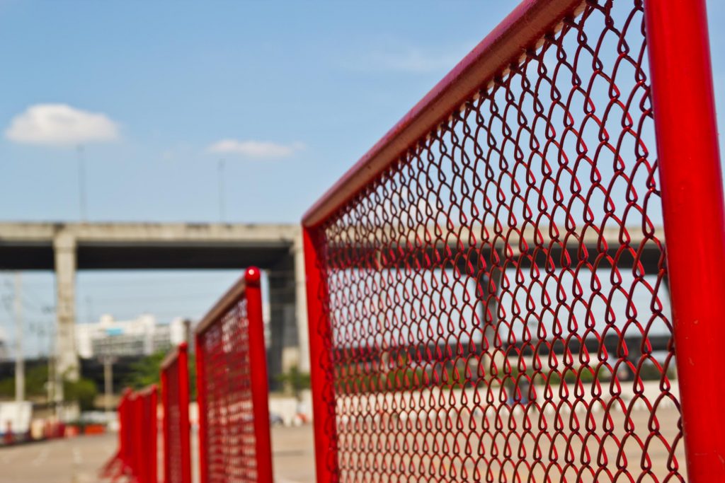 a red commercial fence