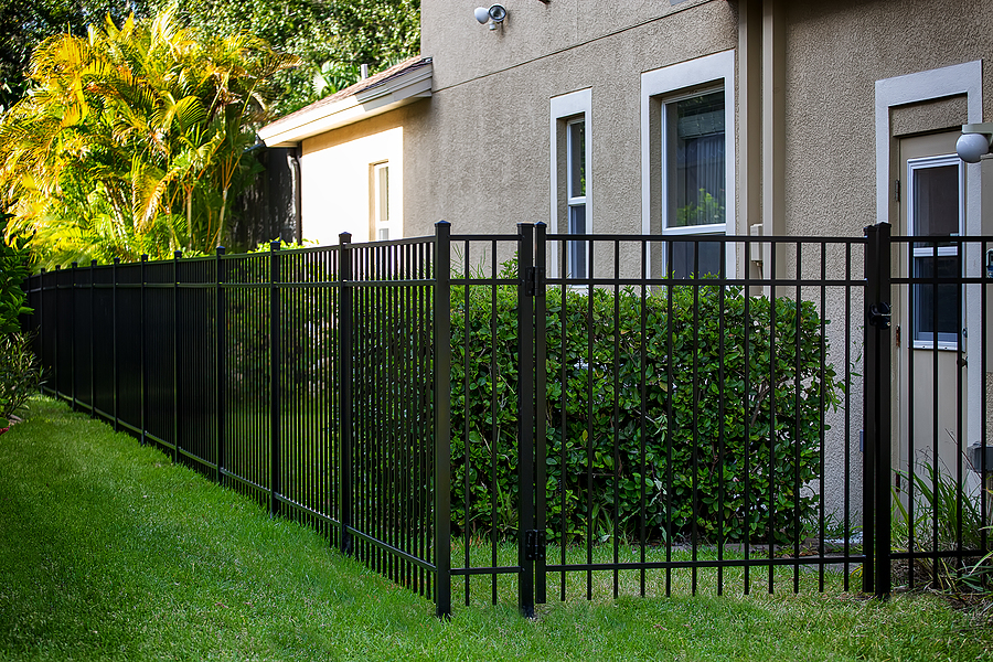 black aluminum fence with gate around your house