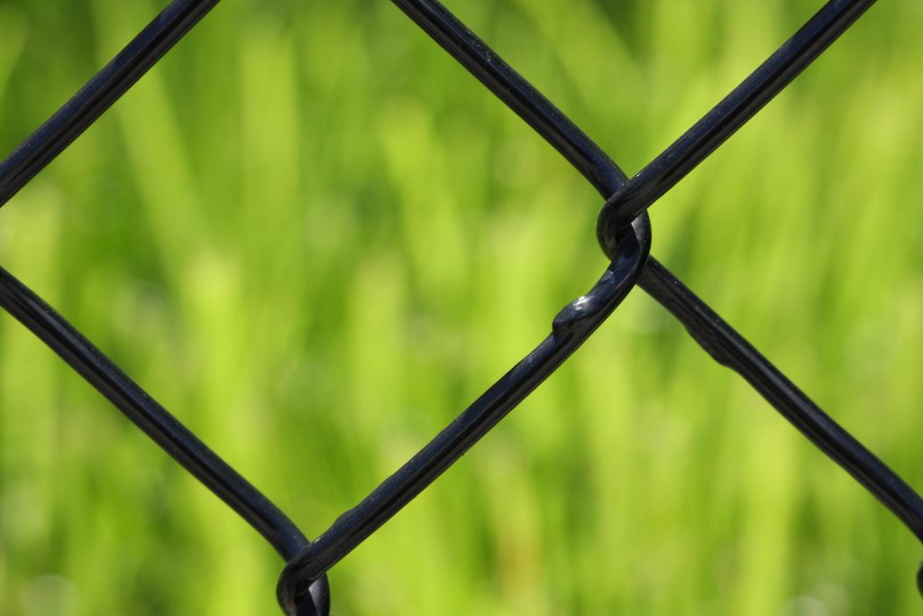 a black chain link fence